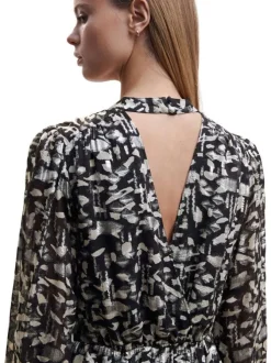 Robe courte noire à imprimé abstrait, doublée, en tissu fluide à col boutonné et manches bouffantes