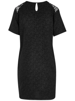 Robe courte noire unie coupe droite avec un col v et une fente au dos