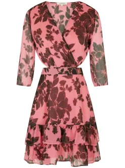 Robe courte rose fleurie transparente au niveau des manches longues et du dos