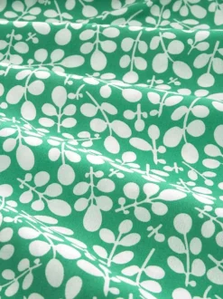 Robe courte verte fleurie coupe droite avec un col tunisien et 6 boutons
