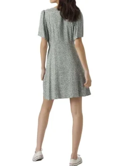Robe courte verte ornée d'un motif à pois et pourvu d'un col v