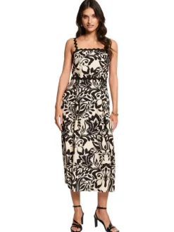 Robe longue beige et noire coupe cintrée pourvue de bretelles et d'un col carré