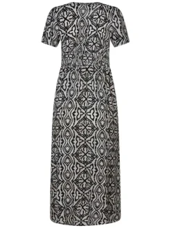 Robe longue beige à motifs pourvue de manches courtes et d'une coupe fluide