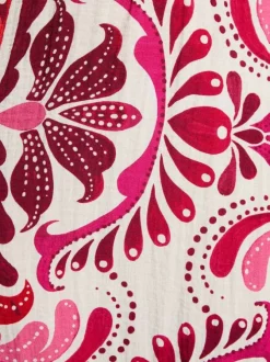 Robe longue rose sans manche à coupe droite pourvue de liens à nouer