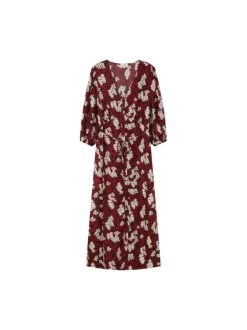 Robe longue rouge col v et manches 3/4 élastiquées aux extrémités avec imprimé feuilles