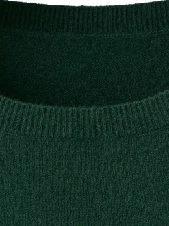 Robe verte coupe ample pourvue d'un col rond et de manches longues