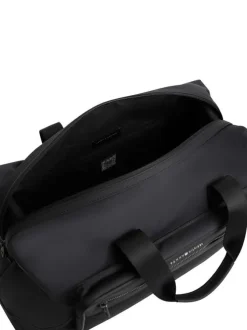 Sac weekender noir pourvu d'une large bandoulière amovible et réglable
