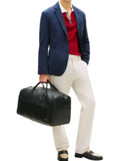 Sac weekender noir pourvu d'une large bandoulière amovible et réglable