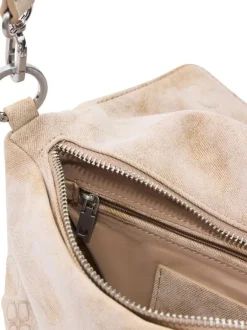 Sac bandouliere beige avec des motifs floraux muni d'une anse