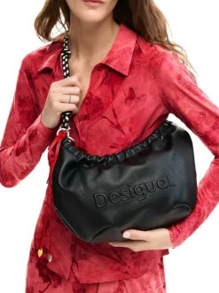 Sac bandouliere noir uni pourvu d'une anse bicolore tressée