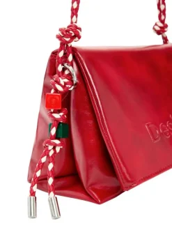 Sac bandouliere rouge uni pourvu d'une anse bicolore tressée