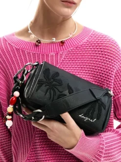 Sac bandoulière noir avec des motifs floraux avec une anse