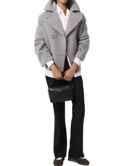 Sac à bandoulière noir en maille lisse pourvu d'une fermeture zippée