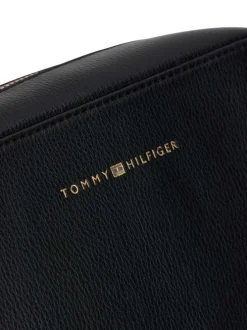 Sac à bandoulière noir pourvu du nom de la marque doré embossé