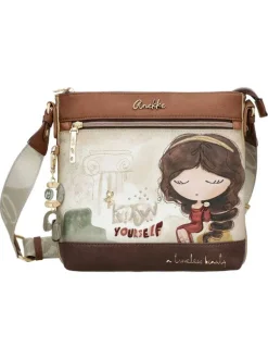 Sac beige et marron avec des imprimés et une bandoulière réglable