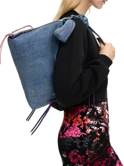 Sac en coton bleu denim uni muni d'une anse et d'une bandoulière