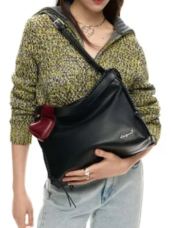 Sac en coton noir uni pourvu d'une anse et une bandoulière