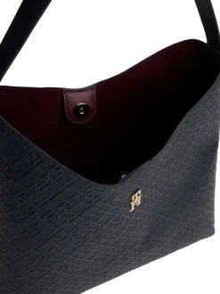 Sac à main marine pourvu d'une fermeture à pression et d'une pochette amovible