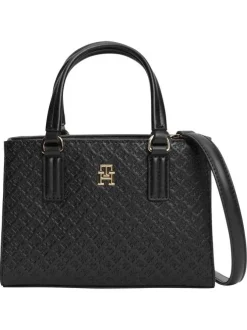 Sac à main noir pourvu d'une bandoulière amovible et de détails dorés