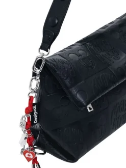 Sac à main noir zippé avec des motifs de dessins animés embossés