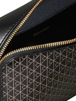 Sac noir avec des motifs monogramme taupe muni d'une bandoulière