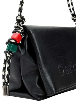 Sac noir uni pourvu d'une anse blanche et noire et d'une bandoulière