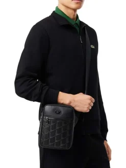 Sacoche en cuir de vache noire à motif embossé pourvue d'une bandoulière