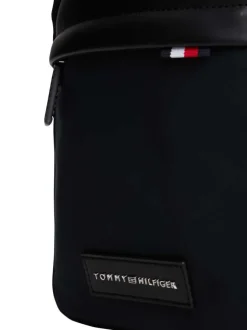 Sacoche noire avec fermetures à glissières et logo de la marque