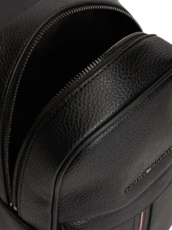 Sacoche noire pourvue d'une bandoulière réglable et du nom de la marque