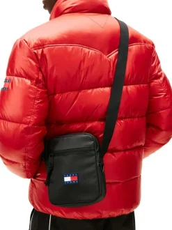 Sacoche noire unie avec une bandoulière ajustable et étiquette cousue