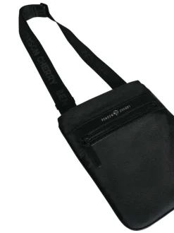 Sacoche noire unie avec un compartiment et une fermeture zippée