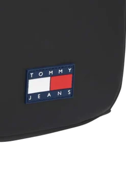 Sacoche noire unie avec une bandoulière ajustable et fermeture à zip