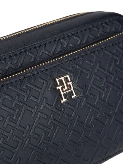 Sacoche marine pourvue d'une bandoulière amovible et du logo de la marque