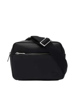 Sacoche noire unie avec un aspect piqué et une poche zippée à l'avant