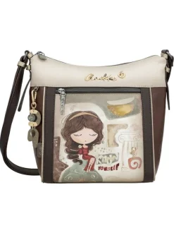 Sac porte épaule beige avec des imprimés et une anse réglable
