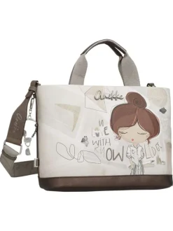 Sac porté main écru imprimé avec un imprimé de la marque sur le pourtour