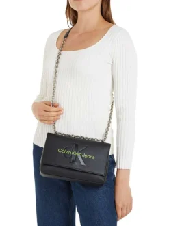 Sac porté épaule noir et vert avec une chaîne métallique et logo à l'avant