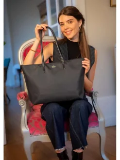 Sac shopping noir uni avec grandes anses et logo crocodile sur l'avant