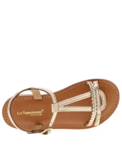 Sandales fille en cuir or à semelle plate et à fermeture avec une boucle