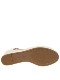 Sandales blanches avec le logo brodé à bout fermé et à talon compensé