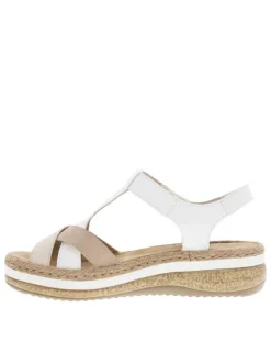 Sandales blanches et beiges à talon compensé et avec des sangles