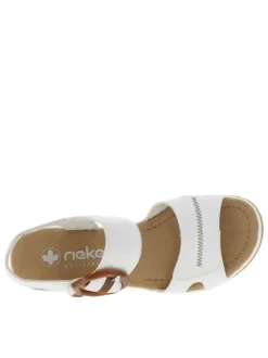 Sandales blanches à talon compensé et à sangle avec une grande boucle à ardillon