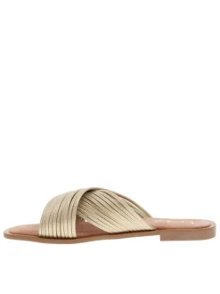 Sandales en assemblage de fines brides dorées croisées et talon décroché bas