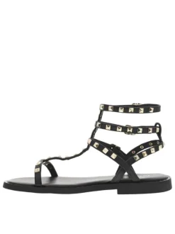 Sandales en cuir noires avec des clous dorés et à talon décroché bas
