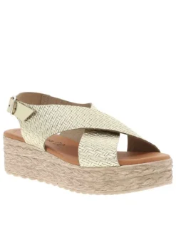Sandales en cuir or avec un talon compensé et une boucle à ardillon