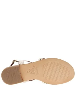Sandales en cuir or roses avec des sangles croisées et à talon décroché bas
