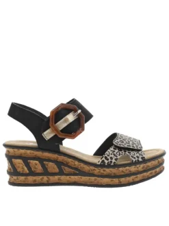 Sandales noires et léopards à talon compensé haut et avec une grande boucle