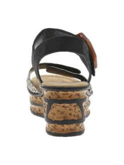 Sandales noires et léopards à talon compensé haut et avec une grande boucle