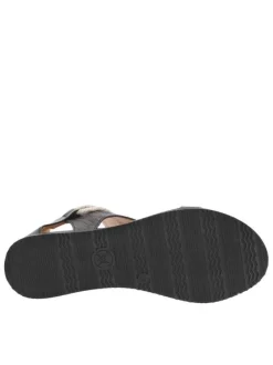 Sandales noires fermées par un zip au talon et à semelle compensée