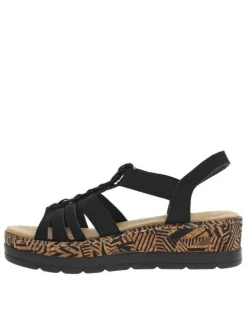 Sandales noires à tige élastiquée et avec un talon compensé bas
